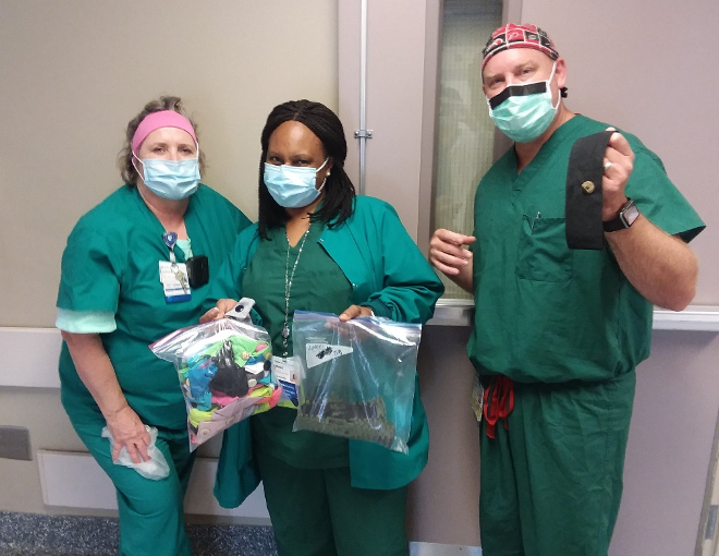 Nurses at Duke Regional Hospital express their gratitude for the gift. From left to right: Eva McCullock, BSN, RN, CNOR, Rene' Livingston Flowers, MHA, BSN, RN, CNOR and Shannon Lamb, CRNA.