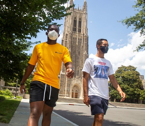 Prince Boadi, left, tours the campus with fellow first-year student John Atwater.  Photo by Shawn Rocco.