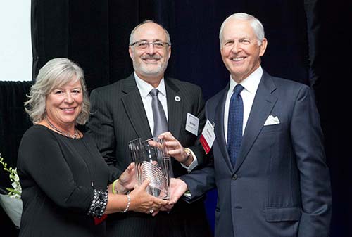 Nancy and Gordon Wright with DCI Executive Director Michael Kastan, MD, PhD, (middle) at the 2014 Shingleton Awards Ceremony, where the Wrights won the Shingleton Award for exceptional service and generosity in furthering the DCI's mission to defeat cancer.