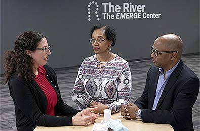 Researcher Meira Epplein (far left) with River Church members, Gilda Suiter and Pastor Ronald L. Godbee