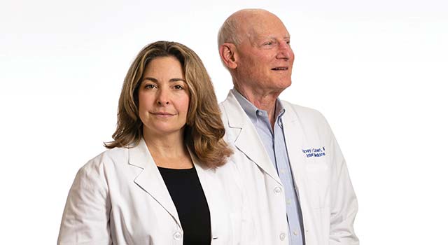Heather Whitson, MD, HS’01-’04 and Harvey Cohen, MD, HS’65-’67, ’69-’71
