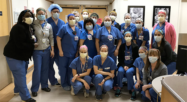 Photo of nurses and staff from Duke Hospital wearing PPE for COVID-19
