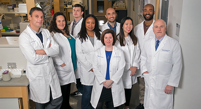 ennifer Freedman (center front), Steve Patierno (far right) and other researchers previously found RNA splicing differences in prostate cancer between African American men and White men. Now Freedman studies RNA splicing differences in lung cancer.