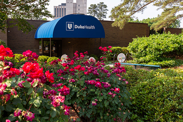 Entrance to Duke Health Building with blue awning