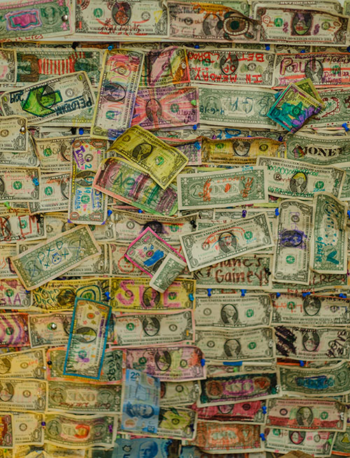 Wall of dollar bills