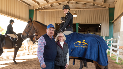 The Pettys with Anna Tyler, a young rider currently taking lessons at Triangle Farms.