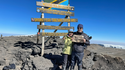 Dr. Shelley Hwang, MD, Mary and Deryl Hart Distinguished Professor of Surgery, and husband John Kim on top of Mount Kilimanjaro in Kenya. 