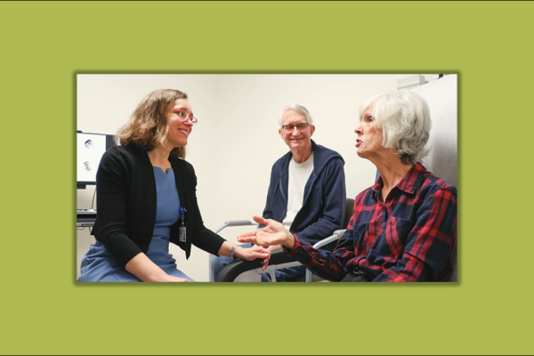 Kim Johnson, MD, consulting with patients