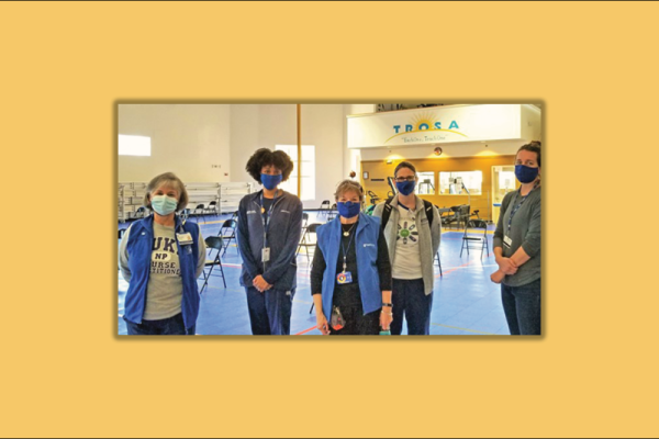 Duke School of Nursing standing at the ready at a TROSA vaccine clinic.
