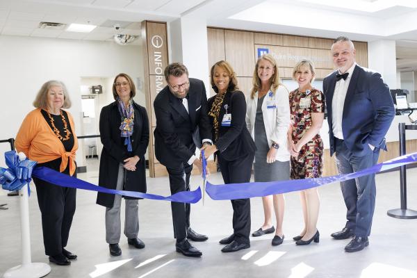 Ribbon cutting: left to right - Patricia Ashley (DCHC), Jane Brown (DCHC), Jason Carter (Duke Regional), Denise Barnes (DCHC), Kristin Merritt (Duke Regional), Leigh Bleecker (Duke Regional), and Brian Burrows (Duke Regional).