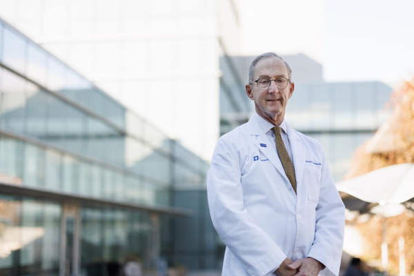 Richard P. Shannon, MD standing in front of the Cancer Center