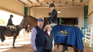 The Pettys with Anna Tyler, a young rider currently taking lessons at Triangle Farms.