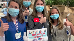 Video thumbnail of masked Duke Employees all with thumbs up in approval