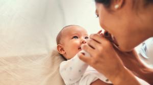 baby and mother looking at each other