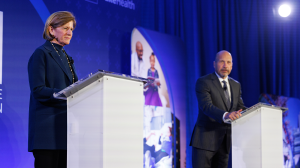 Mary Klotman, MD, and Craig Albanese, MD, MBA, welcome guests from the podium