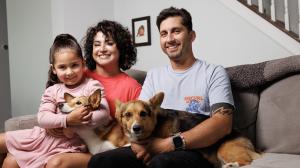Iris Bugbee, her husband, daughter, and dogs. 