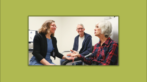 Kim Johnson, MD, consulting with patients