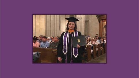 Samantha Casper in a cap and gown holding a diploma