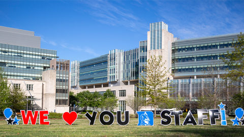 We love you staff written in large letters posted to the Duke Medicine Circle lawn