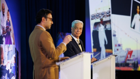 Kunal Patel, MD, PhD, and Dennis Ihnat share the stage