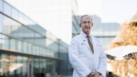 Richard P. Shannon, MD standing in front of the Cancer Center