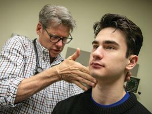 clark being examined by physician Jeffrey Dvergsten