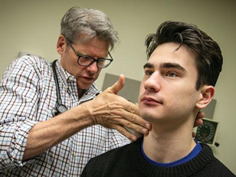clark being examined by physician Jeffrey Dvergsten