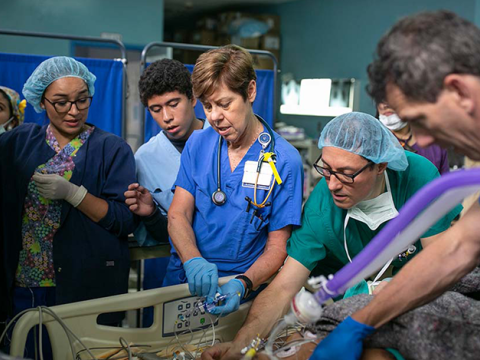 Healthcare workers caring for a patient in Honduras