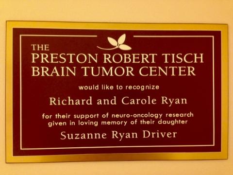 Plaque that says "The Preston Robert Tisch Brain Tumor Center would like to recognize Richard and Carole Ryan for their support of neuro-oncology research given in loving memory of their daughter Suzanne Ryan Driver